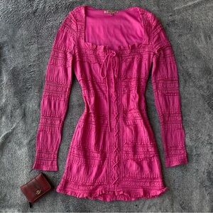 Cutest coquette Pink long sleeve mini dress with lace up detail and ruffles